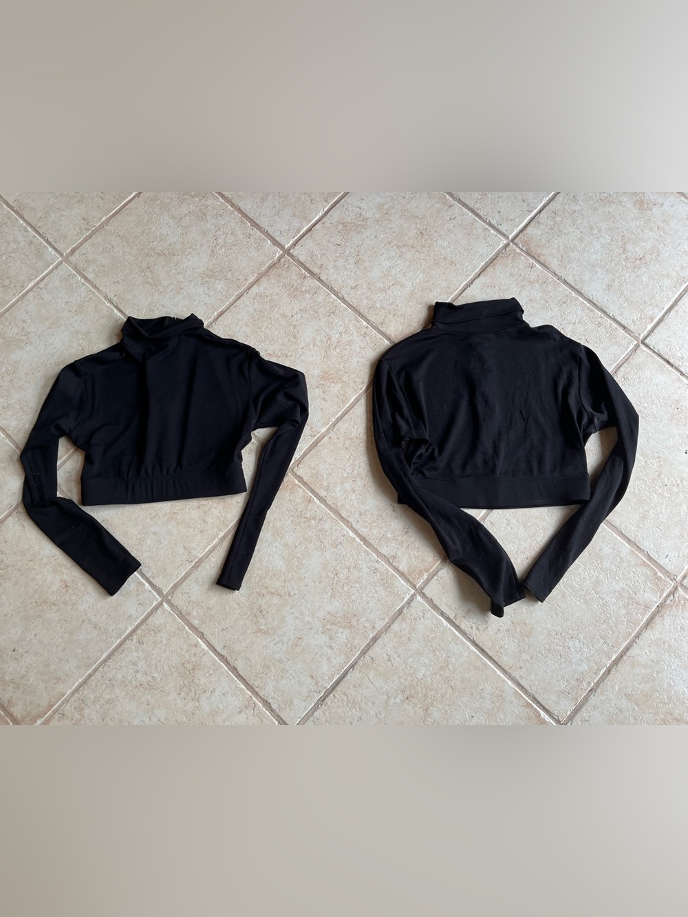 Black Black athletic or under garment quarter crop zip liner top . Youth M and L